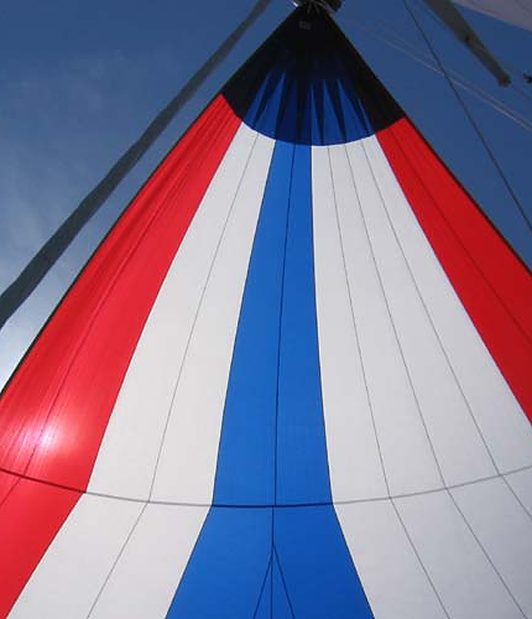 Red, white and blue spinnaker close up